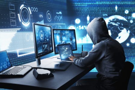 Side view of hacker using computer with digital interface while sitting at desk of blurry interior. Hacking and malware concept. 3D Rendering